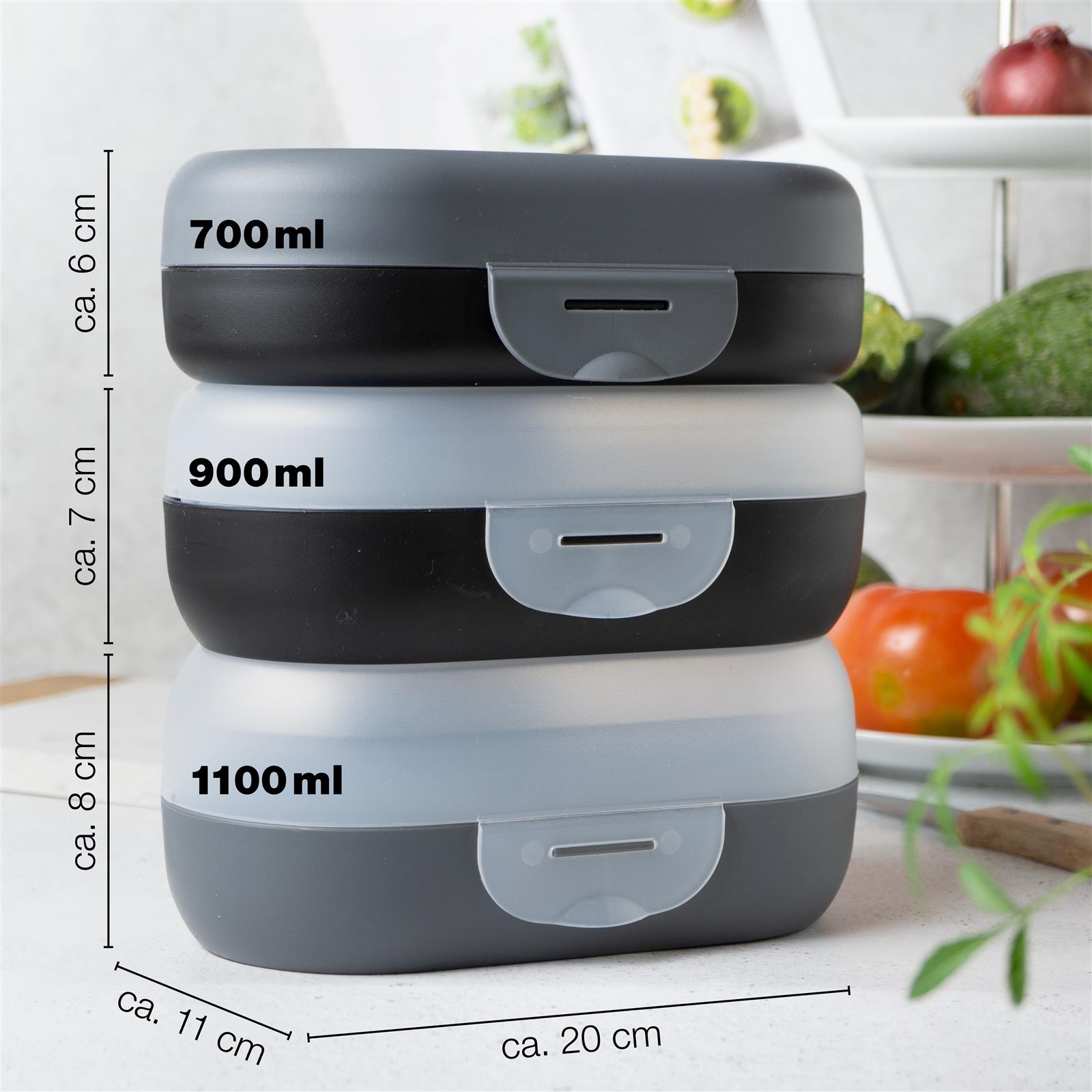 Dunklen Brotdosen auf einem Tisch, mit Design und funktionalem Verschluss, aus Edelstahl