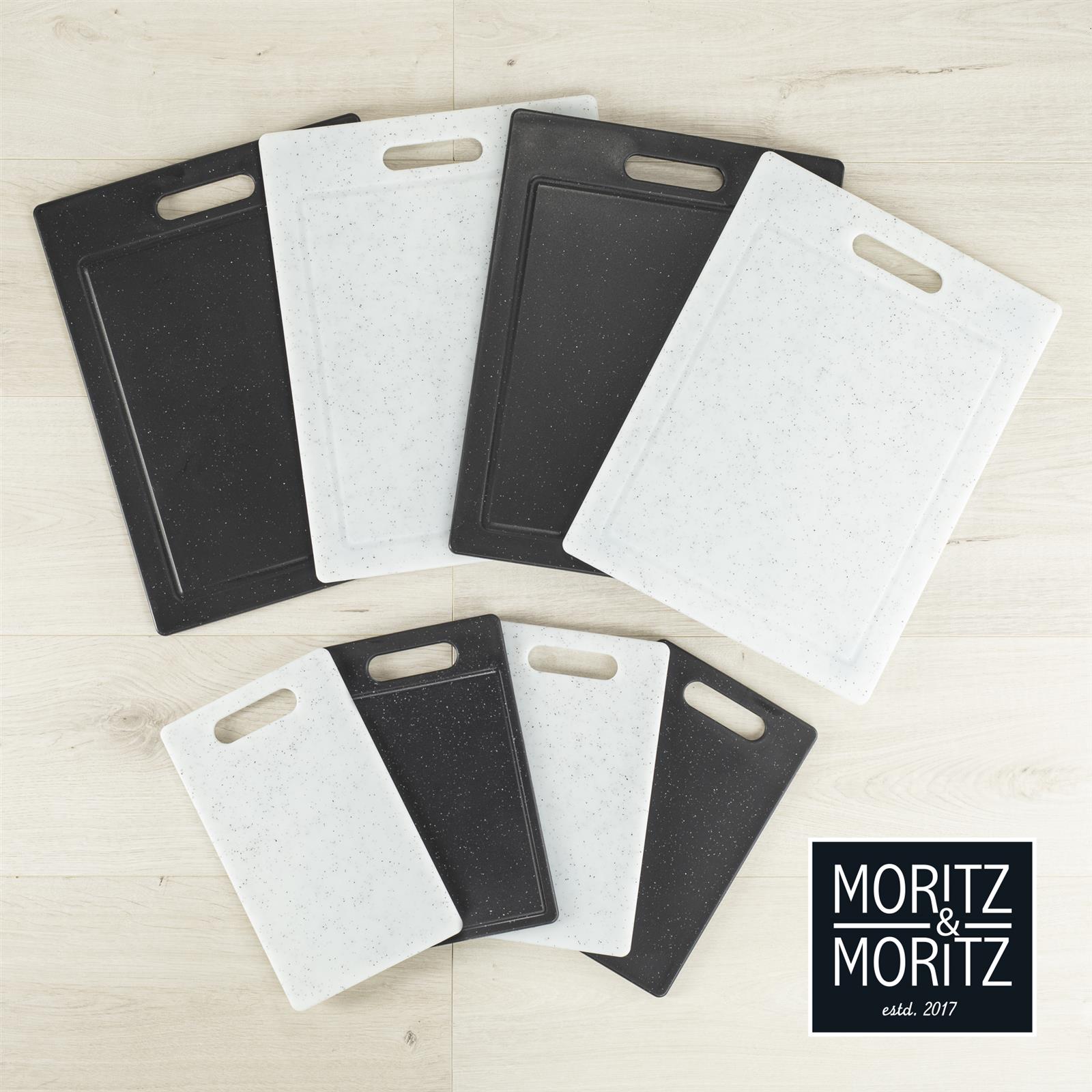 Schneidebrett Granit Schwarz im 2er Set mit Saftrille für die Küche Schneidebrett-Set aus schwarzem Granit mit Saftrille, 2-teilig, auf einer weißen Oberfläche. Ideal für hygienisches Schneiden in der Küche.