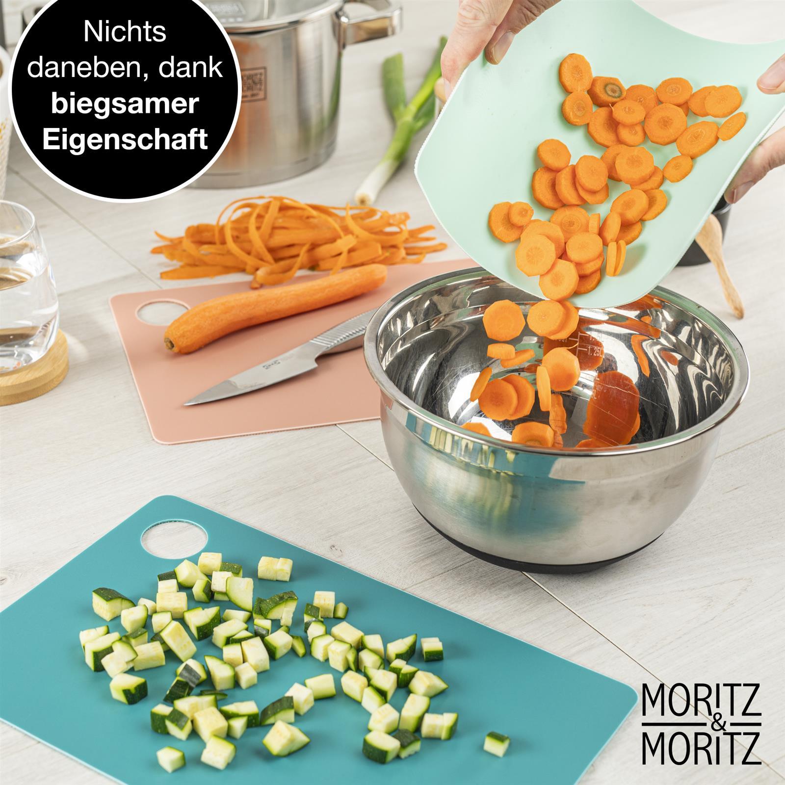 Bunte Schneideunterlage mit verschiedenen Farben und Mustern, ideal für präzises Schneiden, zu sehen auf einem Bild von Moritz und Moritz.