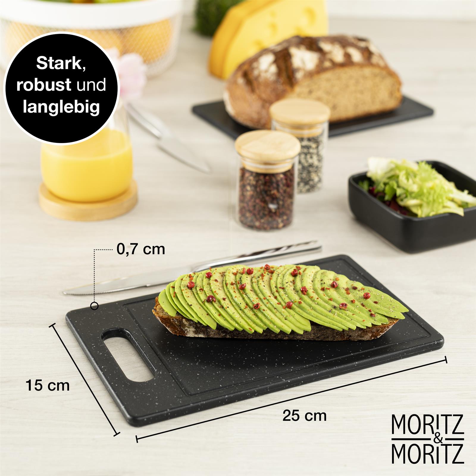 Schwarzes Granit Schneidebrett 2er Set mit Saftrille - Küchenzubehör Schwarzes Granit-Schneidebrett Set in Klein, bestehend aus zwei Brettern mit integrierter Saftrille, auf hellem Hintergrund abgebildet.