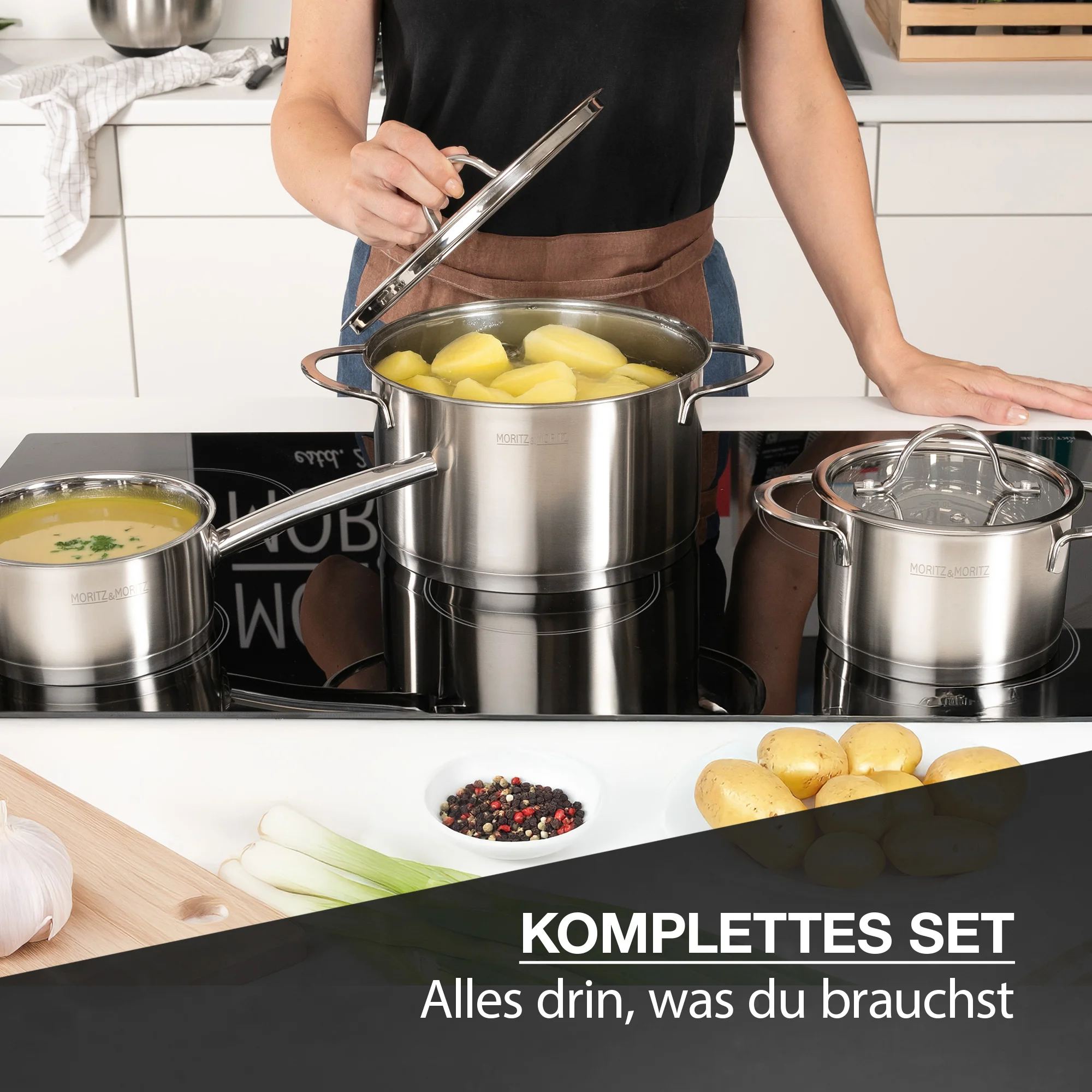 Topf, 5-teilig, aus Edelstahl, in der Hand gehalten