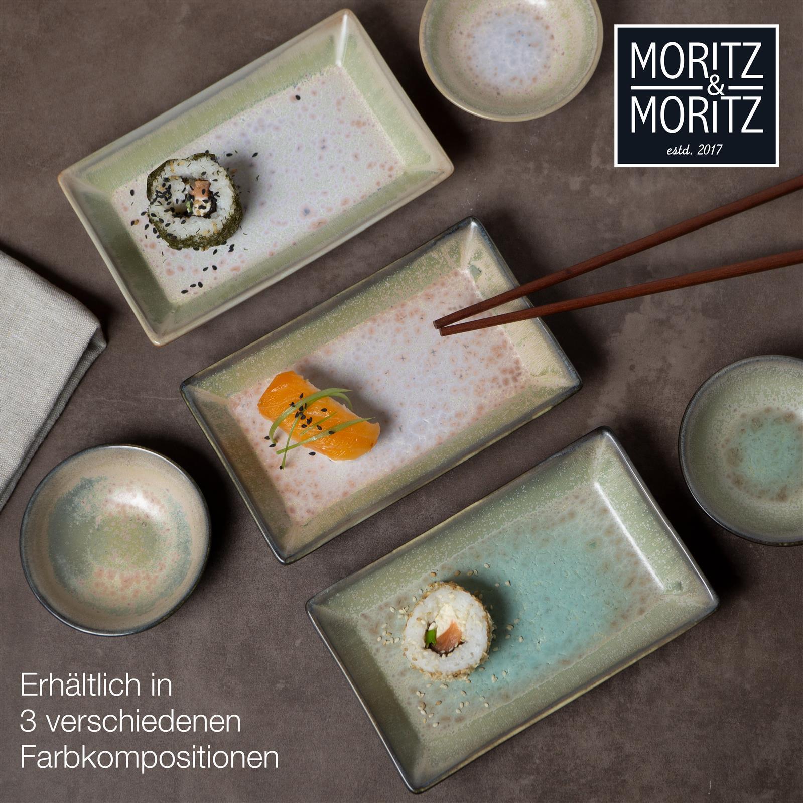 Ein Set aus Gourmet Sushi mit blauen und grünen Akzenten, kunstvoll angerichtet auf einem weißen Teller