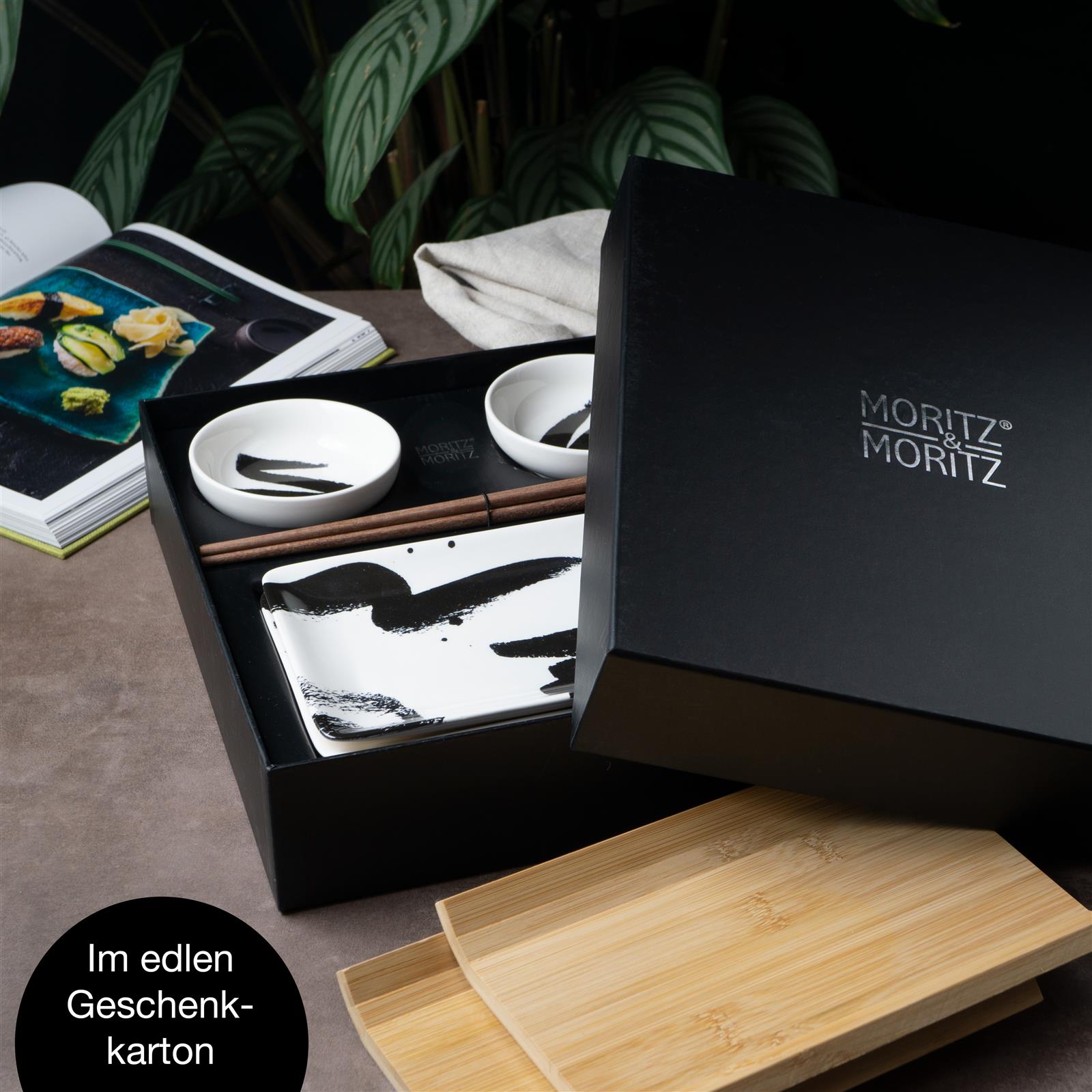 Ein 6-teiliges Sushi-Set in schwarz mit kunstvollen Pinselstrichen, bestehend aus Sojasaucenschälchen, Essstäbchen und Teller