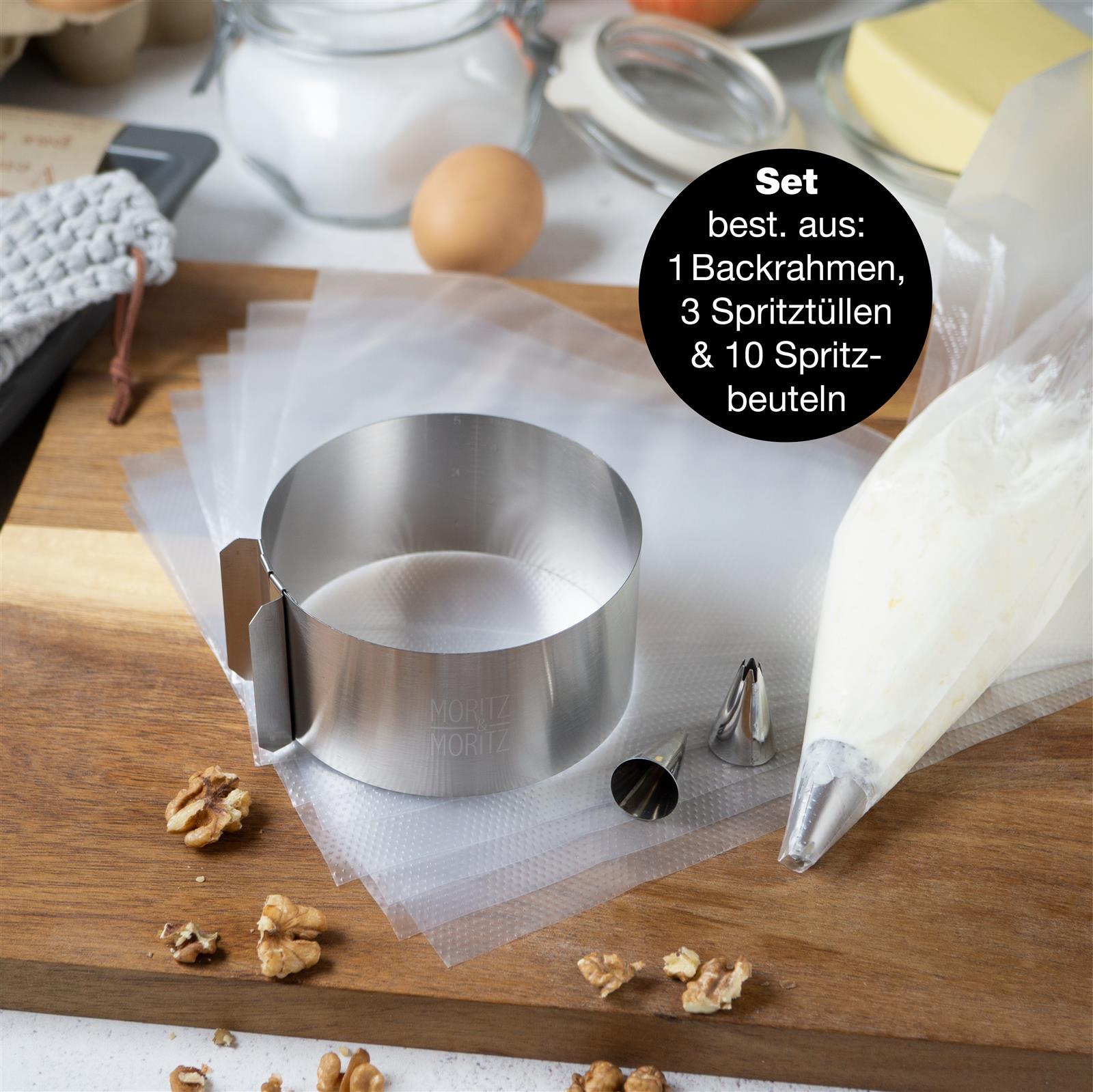 Backrahmen Rund Klein für Perfekte Kuchen und Torten - Moritz & Moritz Runder Backrahmen aus Edelstahl, klein, geeignet zum einfachen Einsetzen und Formen von Kuchen oder Torten, auf einer weißen Oberfläche platziert. Perfekt zum Backen und Gestalten von individuellen Backwerken.