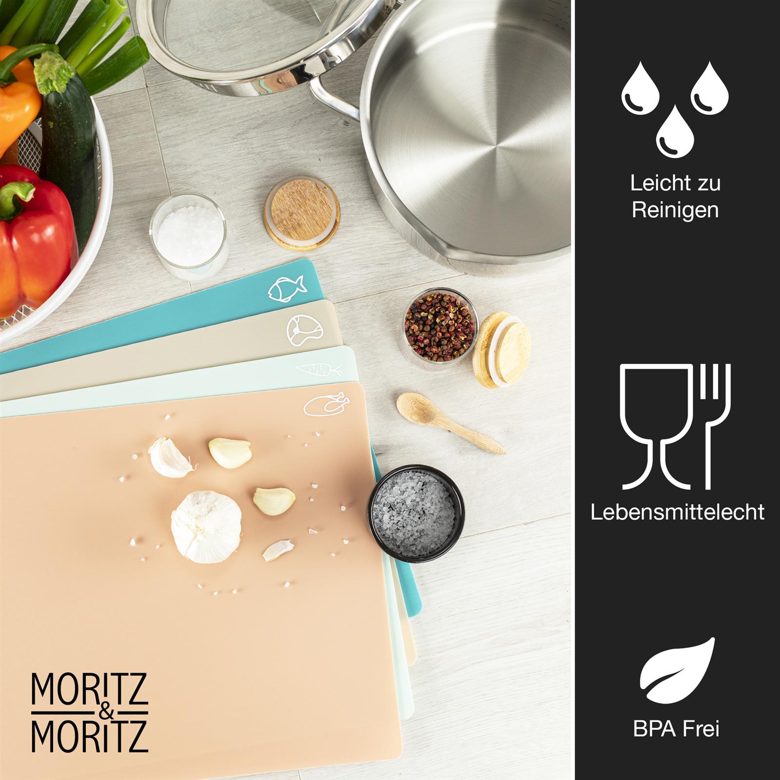 Set aus vier farbenfrohen Schneideunterlagen, ideal zum hygienischen Kochen und Zubereiten; robust und platzsparend gestaltet für vielfältige Küchenanwendungen.